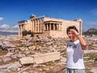 Too much sun for Edie in front of the temple of Athena Nike. No, not the shoe company!